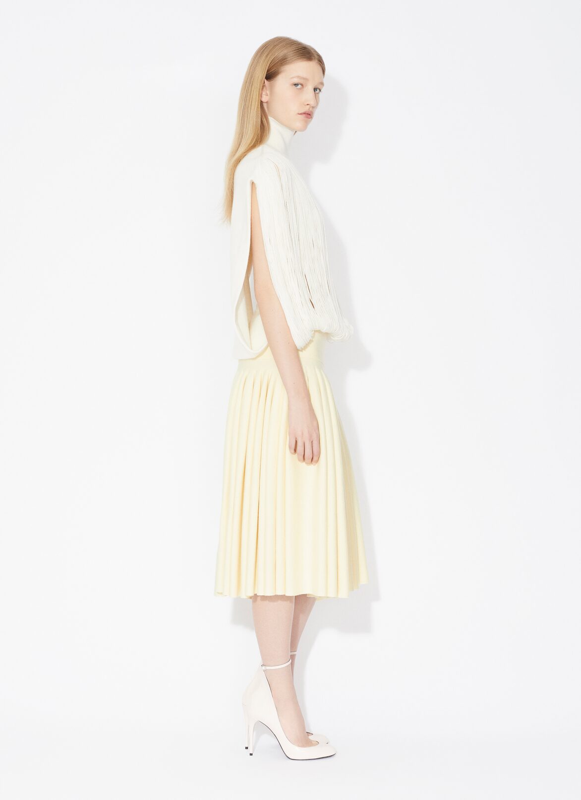 KNITTED FRINGES JUMPER ALAÏA OFF-WHITE KNITTED FRINGES JUMPER